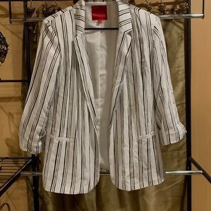 Jennifer Lopez White and Black Raymond Blazer